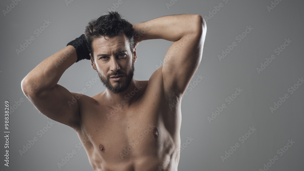 Fototapeta premium Hansome man showing his body