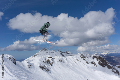 Flying skier on mountains. Extreme sport. © Vasily Merkushev