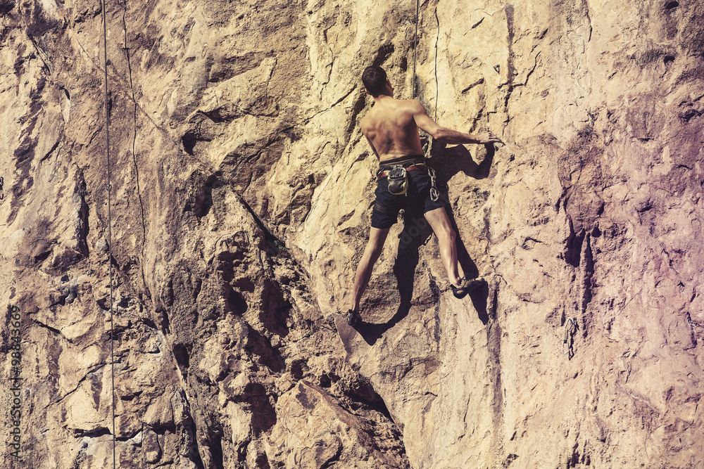 Man standing during mountain climbing.