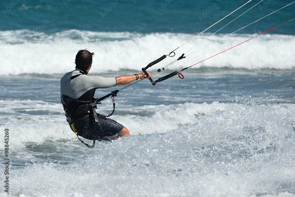 Kite surfer rides