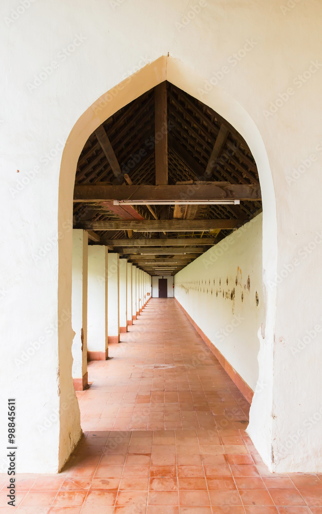 Obraz premium Old white gate, Walking entry way at Pha That Luang in Vientiane Laos.