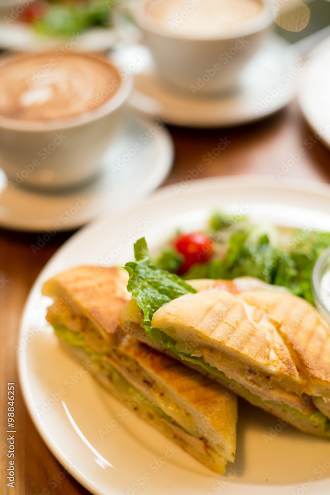 Breakfast with coffee and panini Breakfast with coffee and panini
