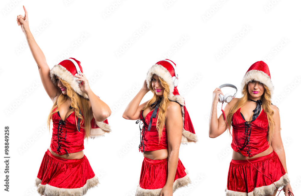 Obraz premium Christmas woman listening music