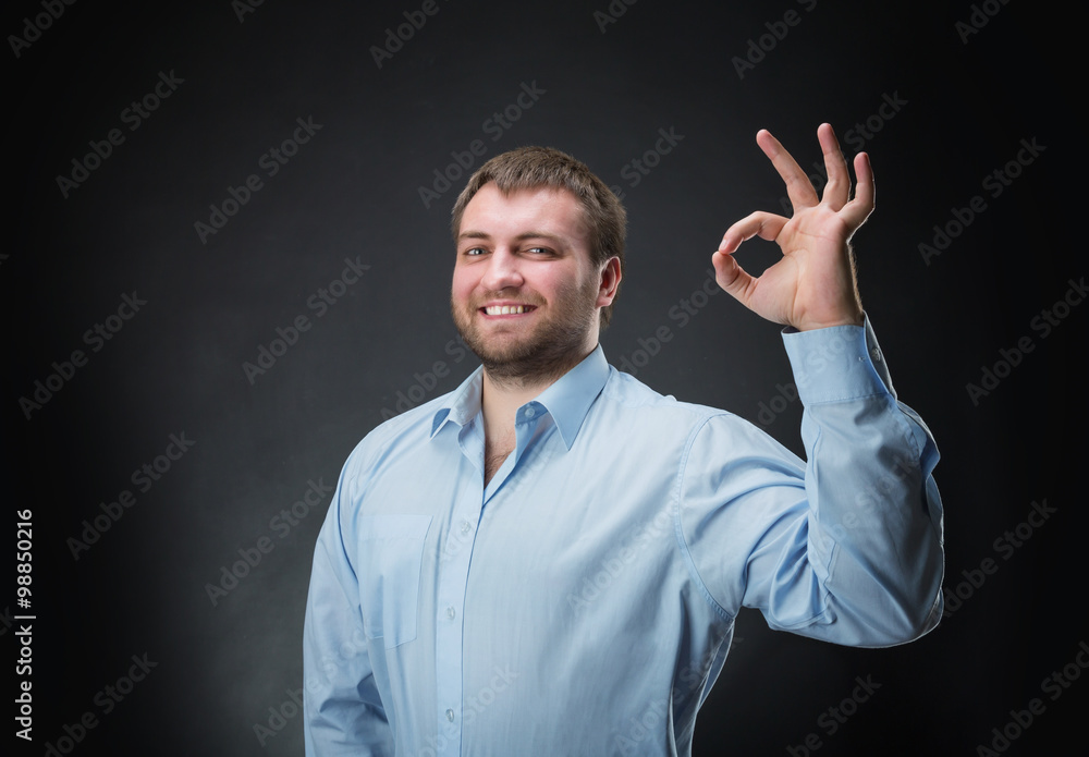 Man showing ok-sign Man showing ok-sign