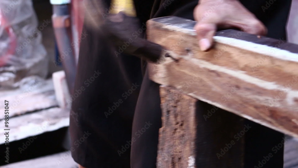 Hammer In Nails Into Wooden Hammer In Nails Into Wooden