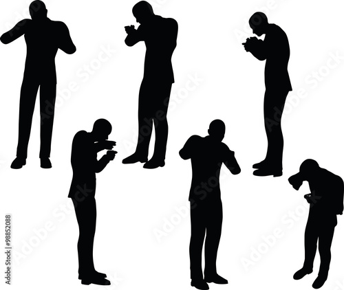 businessman standing eating