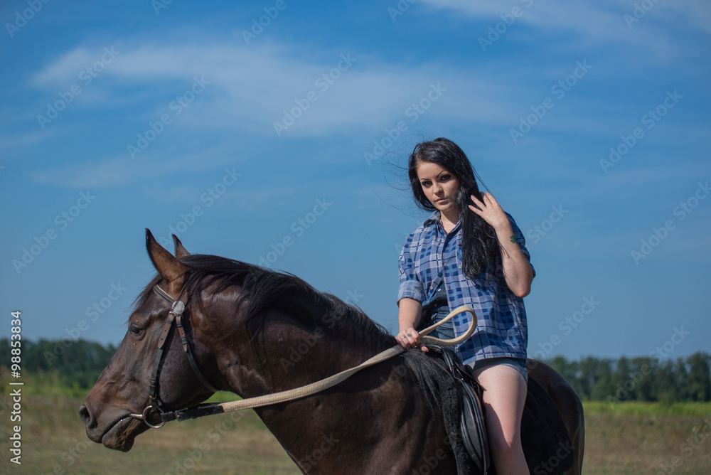 Young beautiful girl with a horse on nature Young beautiful girl with a horse on nature