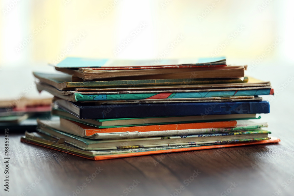 Pile of old books on wooden table Pile of old books on wooden table