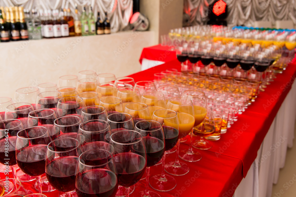 glasses with beverages on the banquet table glasses with beverages on the banquet table