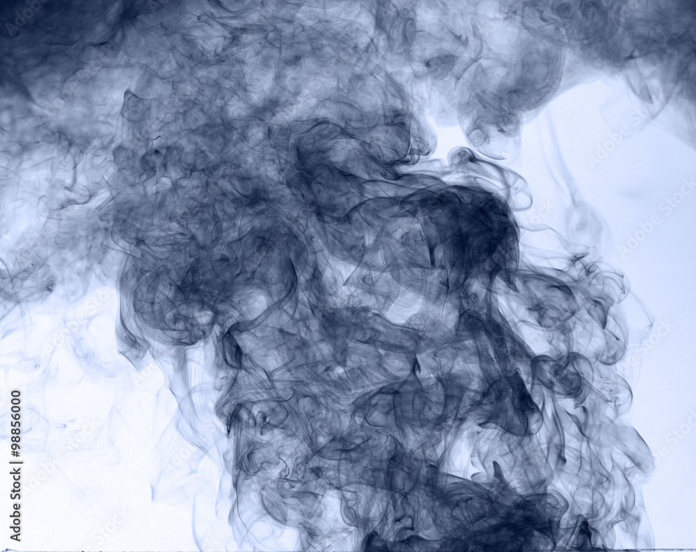 blue smoke on a white background. inversion blue smoke on a white background. inversion