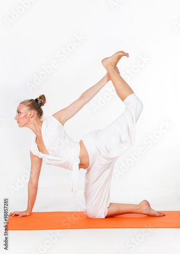 Woman making yoga figure