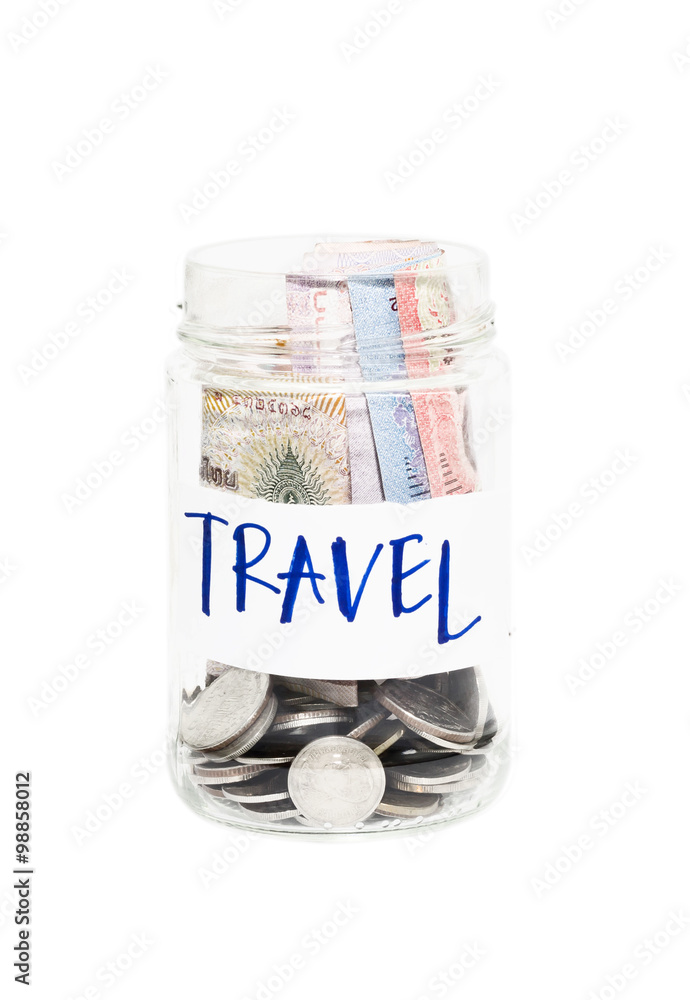 travel budget - money savings in a glass jar travel budget - money savings in a glass jar
