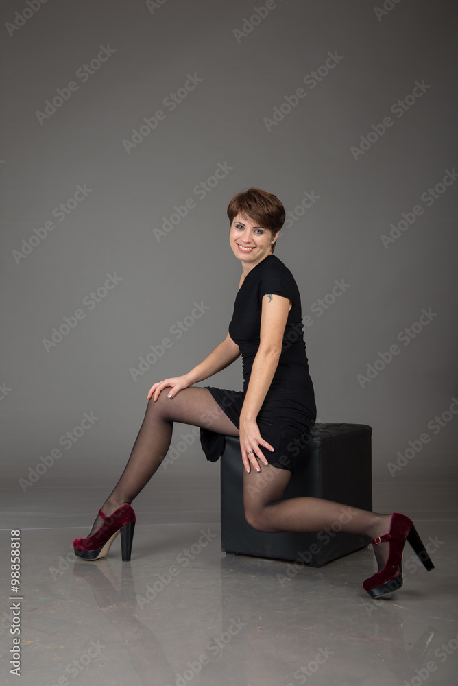 Fototapeta premium cute young girl on the shooting in the studio