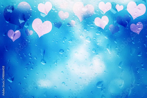 Glass textured shiny pink blue color Valentine's Day Heart shapes illustration background with droplet. Lovely textured Valentine Holidays greeting card copy space background.