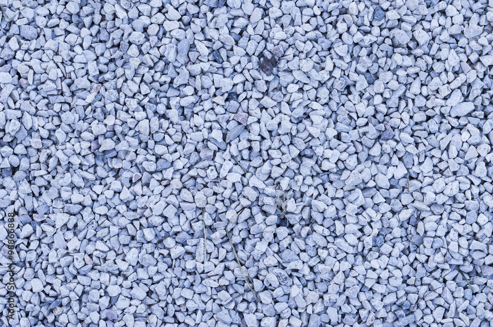 Focus on a granite gravel, useful for texture picture, white - blue color Focus on a granite gravel, useful for texture picture, white - blue color