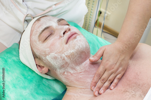 man in the mask cosmetic procedure in spa salon