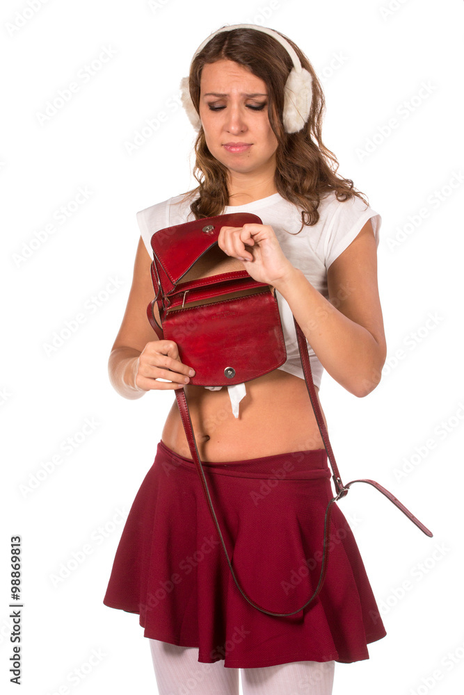 Beautiful woman looking through her pocket book purse Beautiful woman looking through her pocket book purse