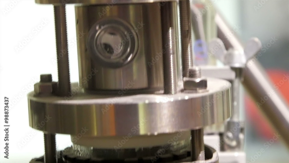 A big telescope that is silver in color. A telescope is an instrument that aids in the observation of remote objects by collecting electromagnetic radiation A big telescope that is silver in color. A telescope is an instrument that aids in the observation of remote objects by collecting electromagnetic radiation