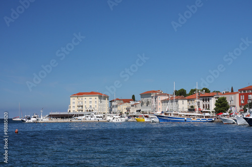 Tourist harbor in Porec in Croatia in the summer day.