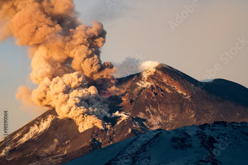 Photo Volcano eruption. Mount Etna erupting from the crater Voragine