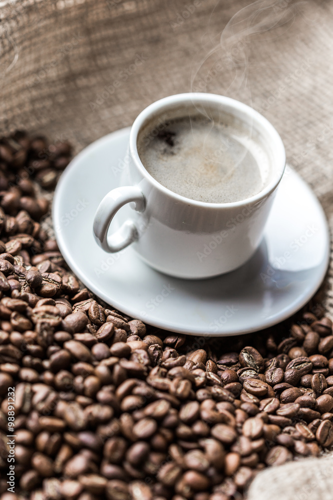 Coffee grains and coffee cup Coffee grains and coffee cup