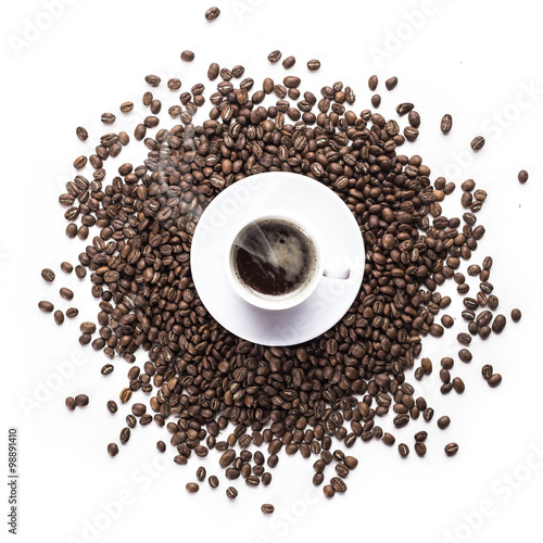 Coffee grains and coffee cup