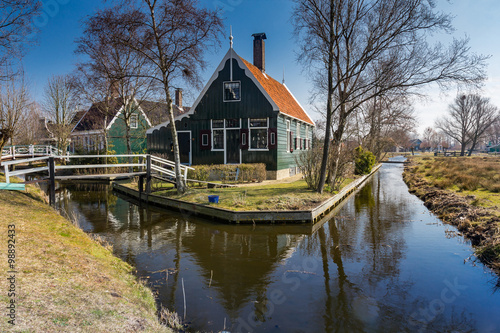 Traditional Dutch old wooden windmill in Zaanse Schans