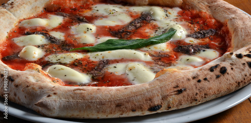 Pizza con anchoas,pizza napolitana. photo