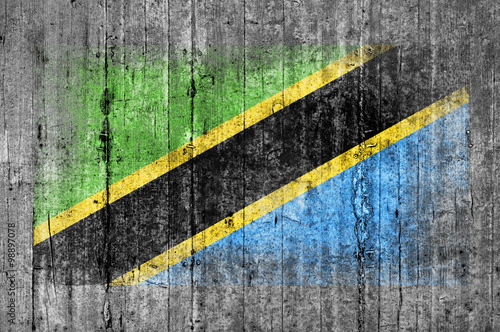 Tanzania flag painted on background texture gray concrete