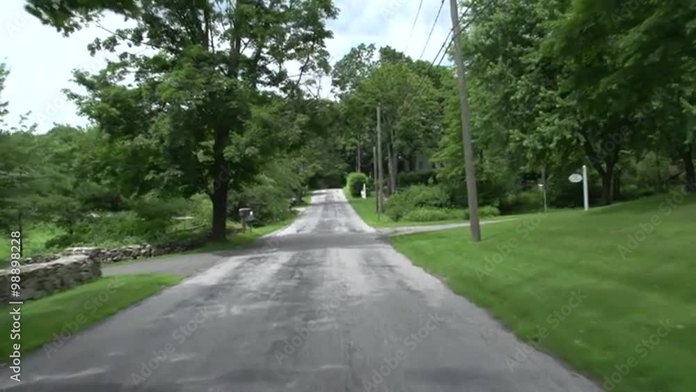 Driving along a New England country road Driving along a New England country road