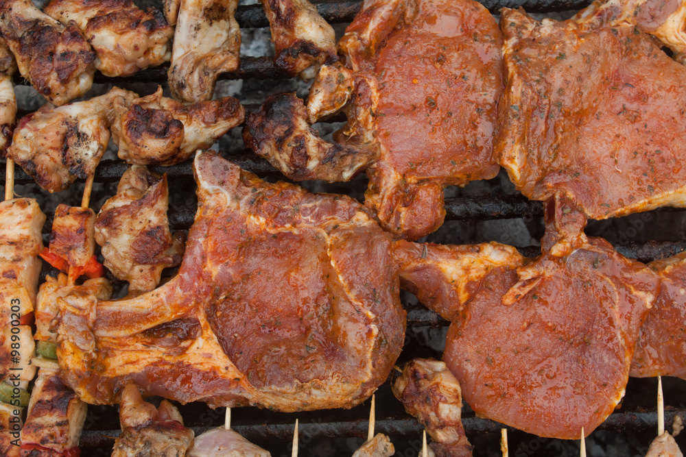 various meat chicken wings steaks grilled on brazier various meat chicken wings steaks grilled on brazier