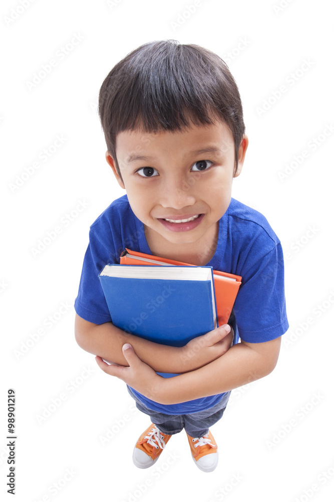 Little boy holding books on white background Little boy holding books on white background