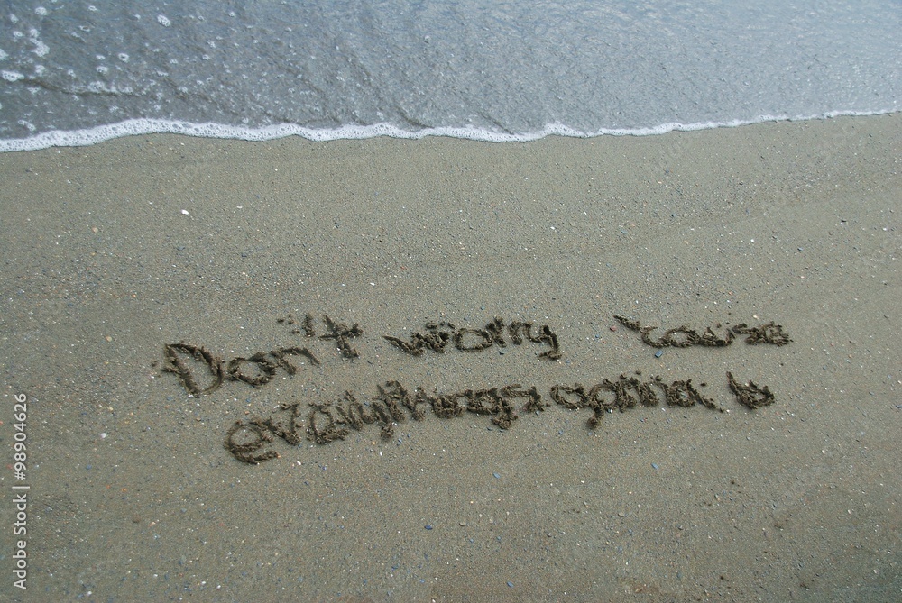 Fototapeta premium Escribir en la arena