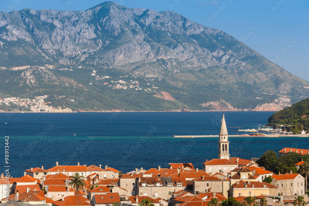 View of the old town of Budva and Sveti Nikola island in summertime. Montenegro.