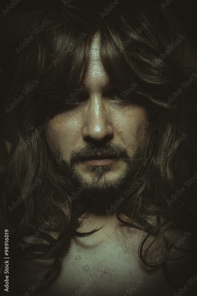 Faith, jesus christ with long hair in the foreground, a man of d Faith, jesus christ with long hair in the foreground, a man of d