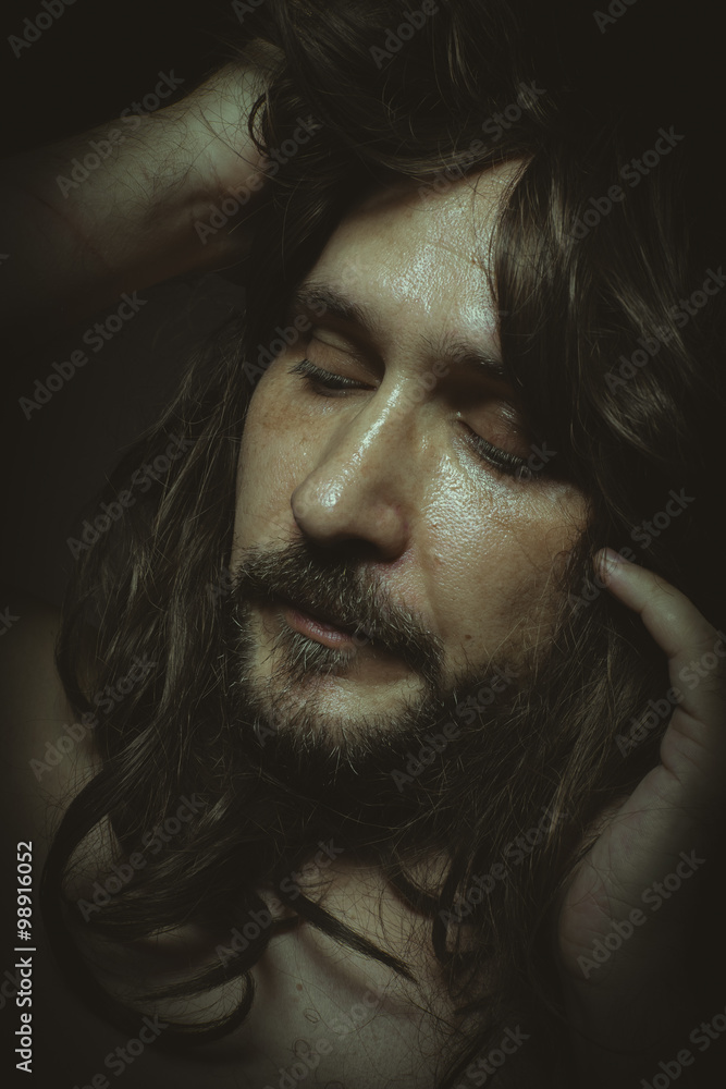 Faith, jesus christ with long hair in the foreground, a man of d Faith, jesus christ with long hair in the foreground, a man of d