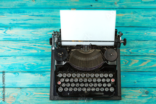 Tableau sur toile Old Typewriter with white paper