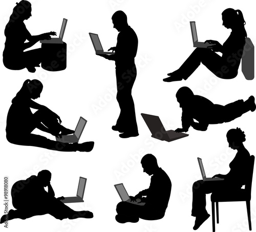 people working on their laptops silhouettes