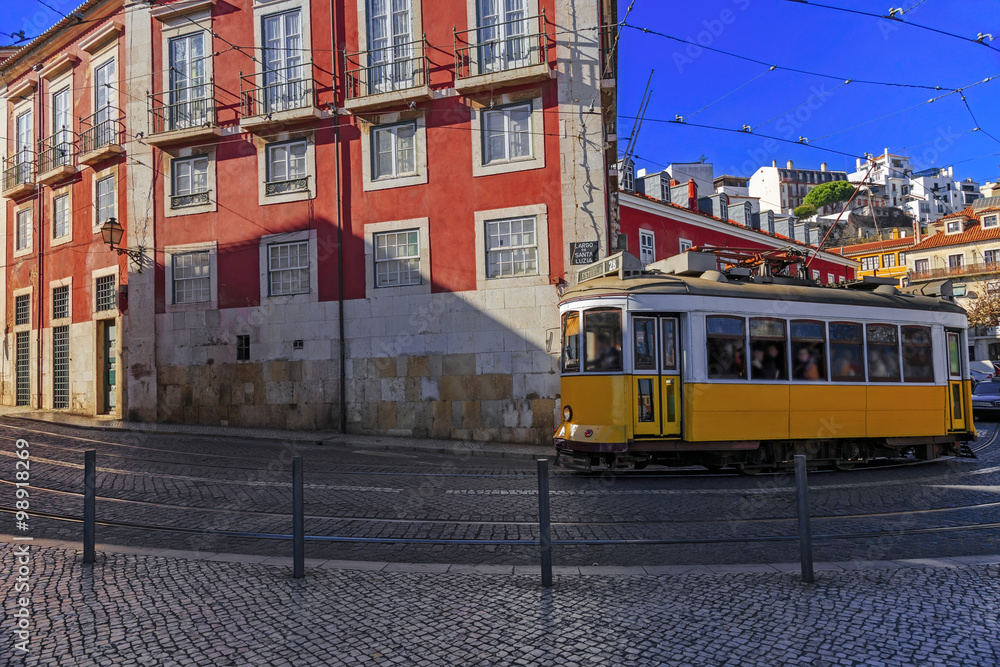 Vintage Lisbon tram on city street