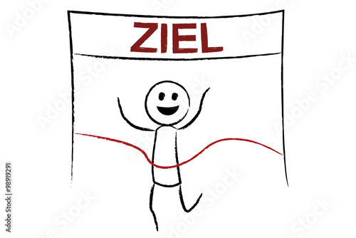 Mann läuft durch Ziellinie