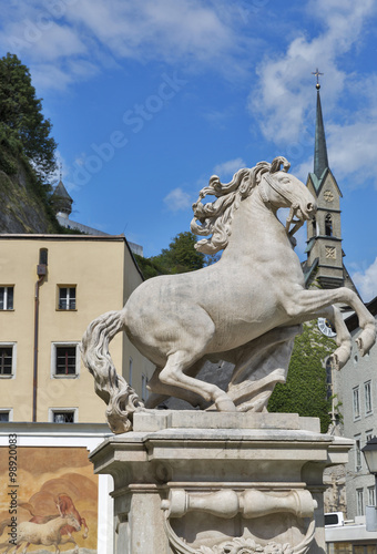 Horse Well in Salzburg with a horse sculpture photo