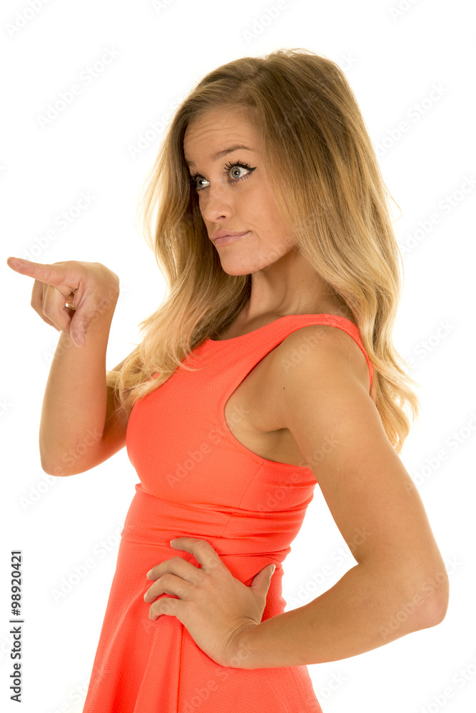 Fototapeta premium woman stand in red dress point side