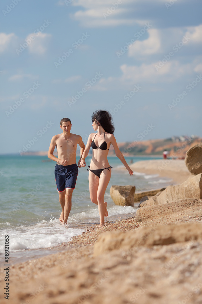 Fototapeta premium Attractive couple at the sea