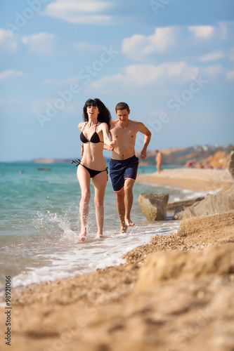 Attractive couple at the sea