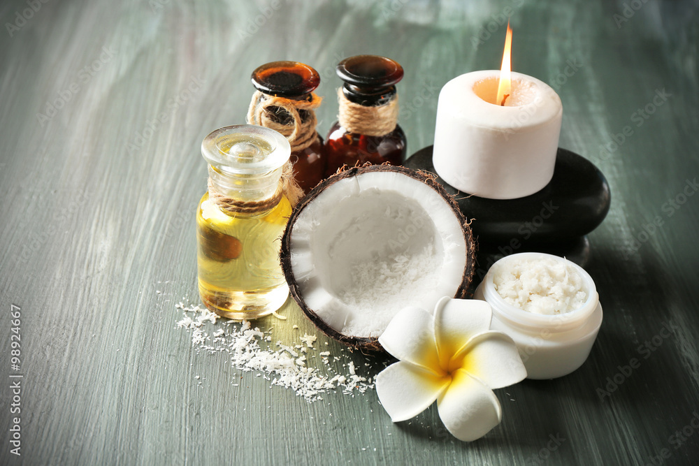 Spa coconut products on dark wooden background Spa coconut products on dark wooden background