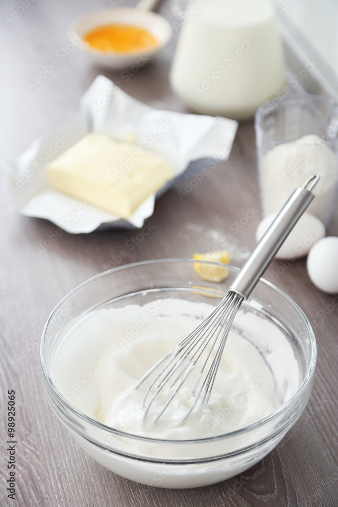 Cooking buttery cream on kitchen Cooking buttery cream on kitchen