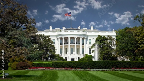 White House with Background Clouds in Time Lapse. photo