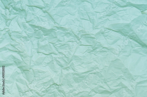 Close-up of blue-green paper showing texture  