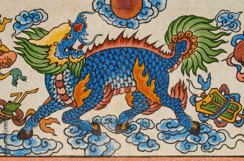 blue kirin painting on granite wall