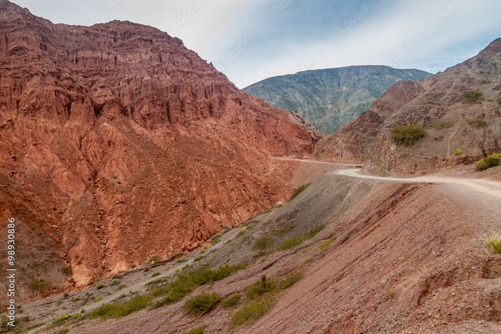 Fototapeta premium Colorful rock formations near Purmamarca village (Quebrada de Humahuaca valley), Argentina